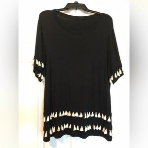 Women’s blouse with white tassels